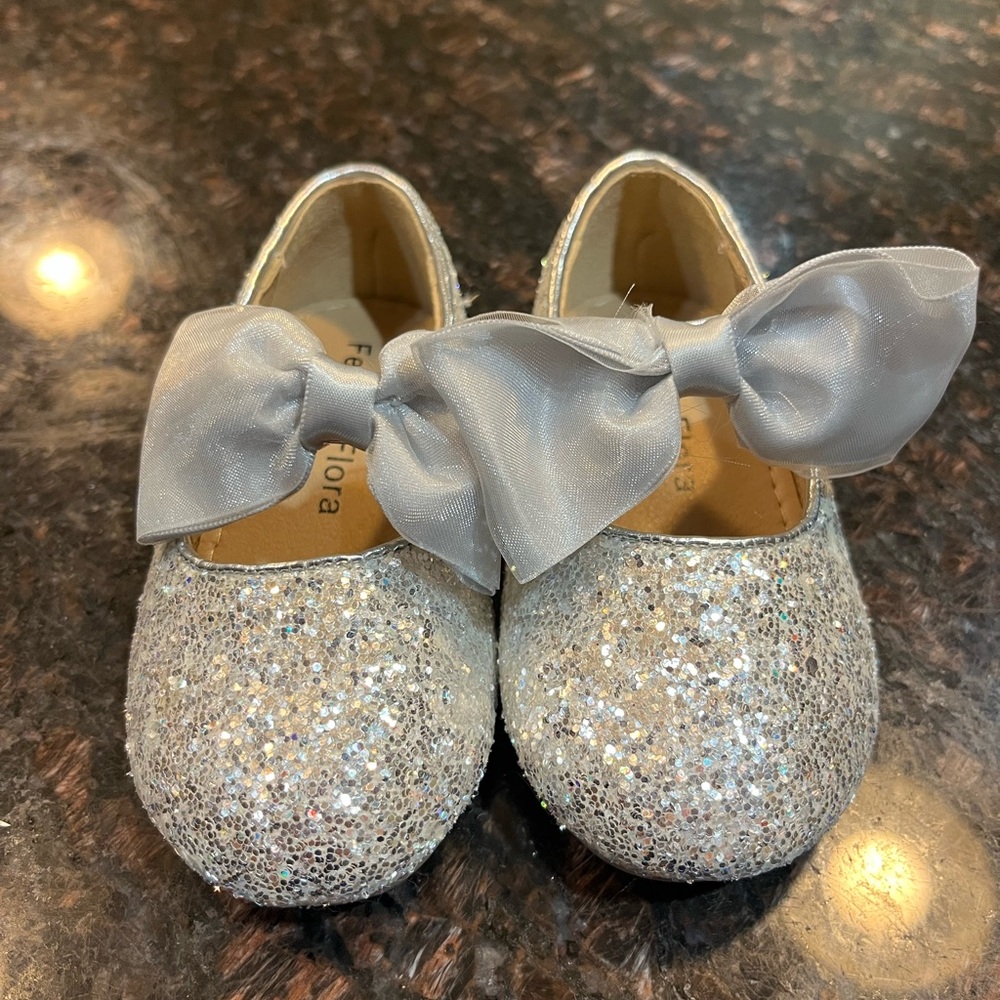 Silver dress shoes for toddlers.